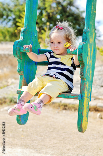 Photo: swinging toddler girl swinging toddler girl