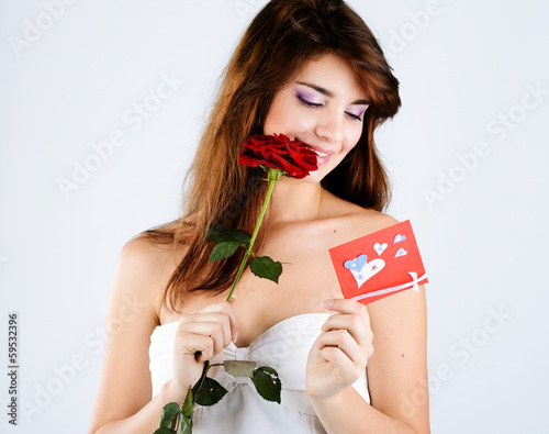 Photo: girl with rose and card girl with rose and card