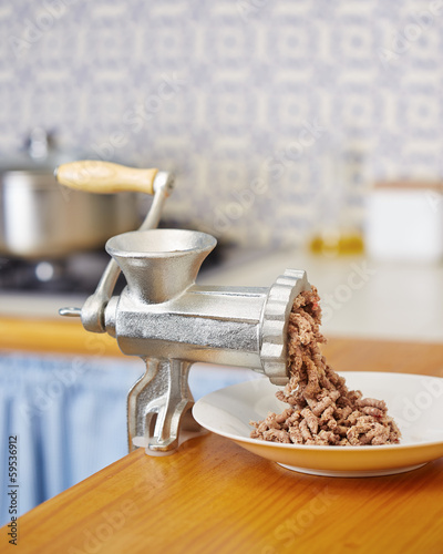 Photo: Meat grinder in domestic kitchen Meat grinder in domestic kitchen