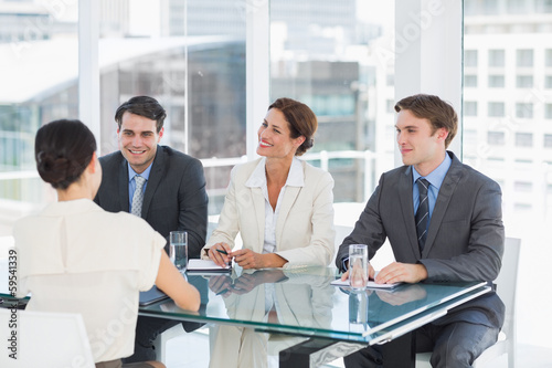 Photo: Recruiters checking the candidate during job interview Recruiters checking the candidate during job interview