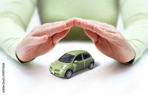 Photo: safety your car - hands covering safety your car - hands covering