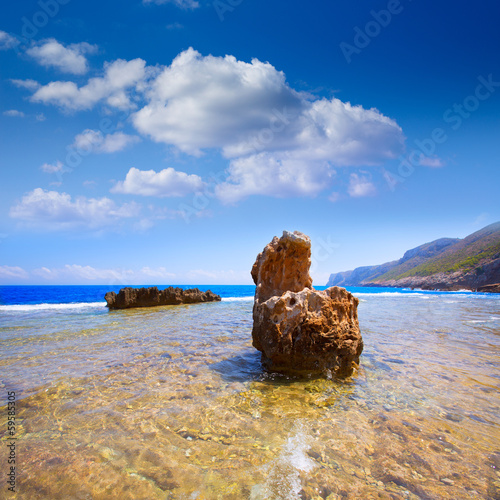 Photo: Denia Alicante Las rotas rocky beach in Spain Denia Alicante Las rotas rocky beach in Spain