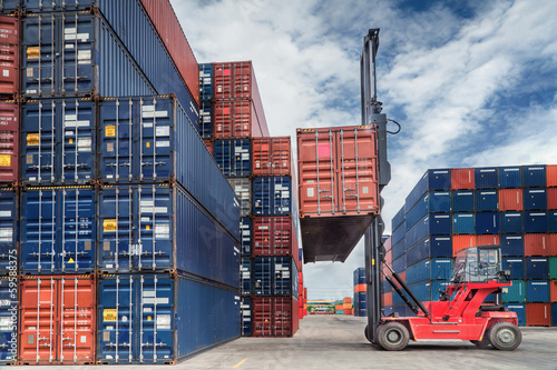 Photo: Crane lifter handling container box Crane lifter handling container box