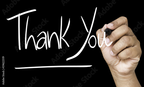 Photo: Thank You hand writing on a transparent board Thank You hand writing on a transparent board