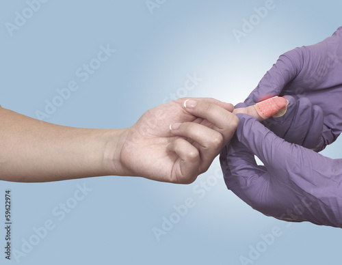 Photo: Nurse is wounding Adhesive Bandage Nurse is wounding Adhesive Bandage