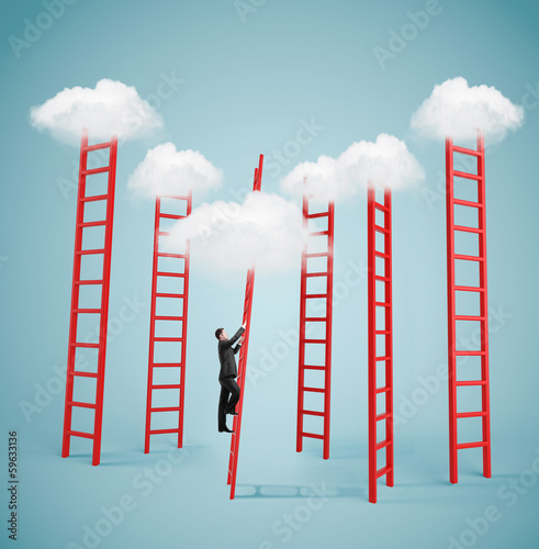 Photo: businessman climbing to cloud businessman climbing to cloud