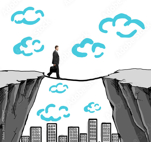 Photo: businessman walking on rope businessman walking on rope