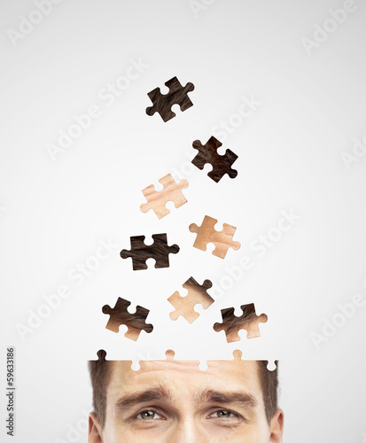 Photo: head built of puzzle head built of puzzle