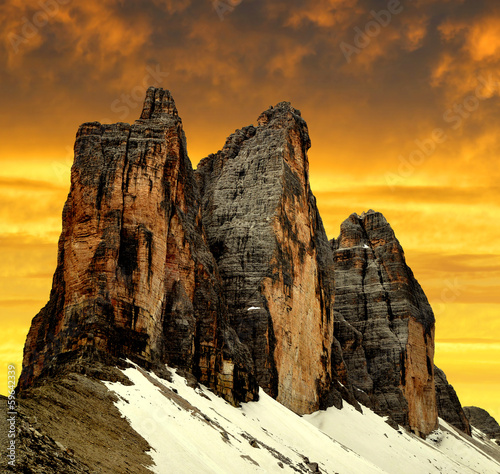 Photo: Tre cime di Lavaredo in the sunset , Dolomite Alps, Italy Tre cime di Lavaredo in the sunset , Dolomite Alps, Italy