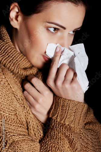 Photo: Young woman having depression with tissue. Young woman having depression with tissue.