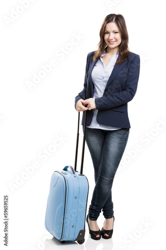 Photo: Business woman carrying a suitcase Business woman carrying a suitcase