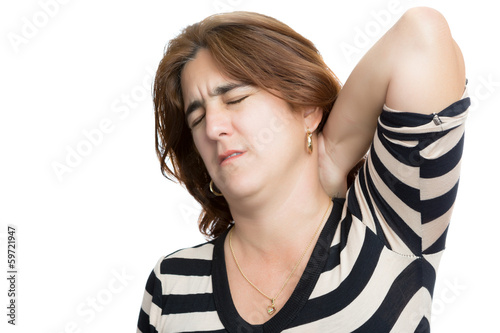 Photo: Hispanic woman suffering from neck or cervical pain i Hispanic woman suffering from neck or cervical pain i