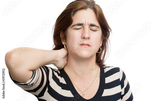 Photo: Hispanic woman suffering from neck or cervical pain Hispanic woman suffering from neck or cervical pain
