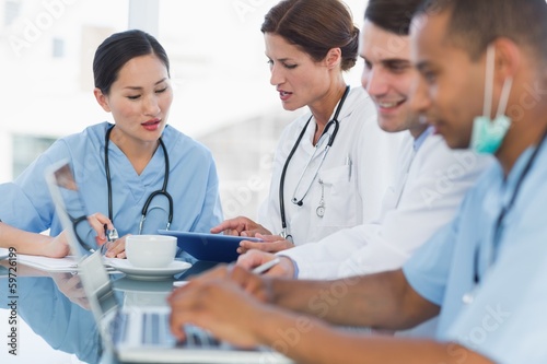 Photo: Doctors in a meeting at hospital Doctors in a meeting at hospital