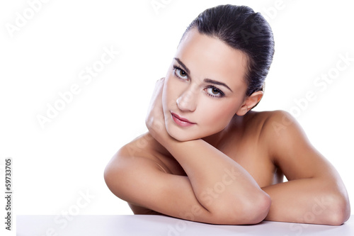 Photo: portrait of a beautiful girl on white background portrait of a beautiful girl on white background