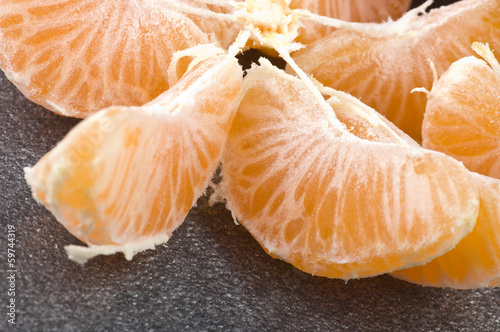 Photo: Orange mandarin or tangerine fruit with leaves Orange mandarin or tangerine fruit with leaves