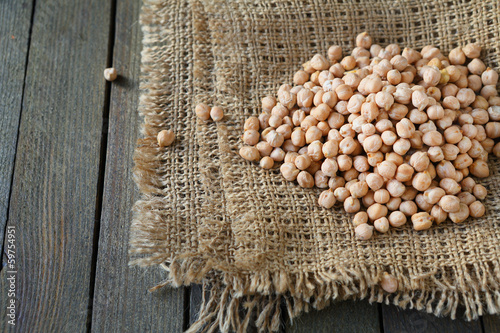 Photo: raw chickpeas on sacking raw chickpeas on sacking