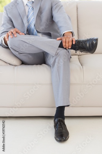 Photo: Businessman on couch Businessman on couch