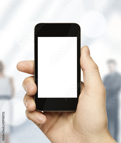 Photo: hand holding phone hand holding phone