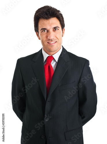 Photo: Smiling businessman isolated on white Smiling businessman isolated on white