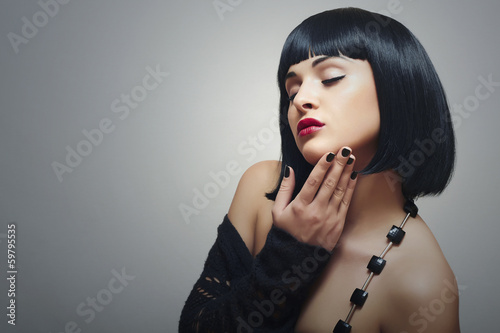 Photo: Retro Beautiful Brunette Girl.Black Hair. Beauty Vintage Woman Retro Beautiful Brunette Girl.Black Hair. Beauty Vintage Woman