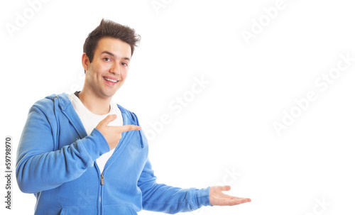 Photo: Hispanic guy with blue jersey presents something Hispanic guy with blue jersey presents something