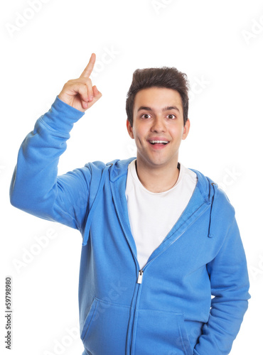 Photo: Hispanic guy pointing upwards Hispanic guy pointing upwards