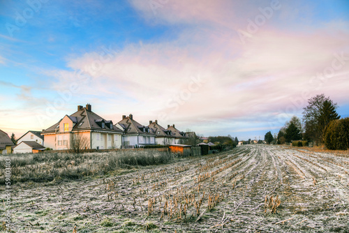 Photo: sunrise in a suburb of Munich with Chinool winds and houses at t sunrise in a suburb of Munich with Chinool winds and houses at t