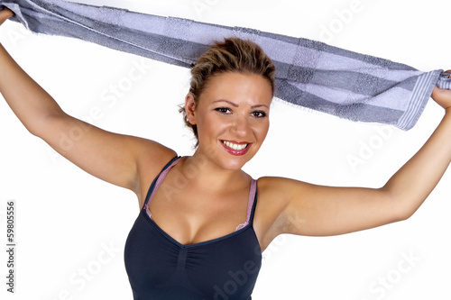 Photo: Lachende junge Frau mit Handtuch Lachende junge Frau mit Handtuch