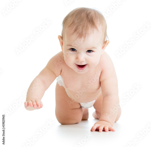 Photo: pretty crawling baby girl isolated on white background pretty crawling baby girl isolated on white background