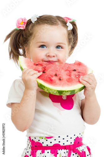 Photo: child girl eating watermelon isolated on white child girl eating watermelon isolated on white