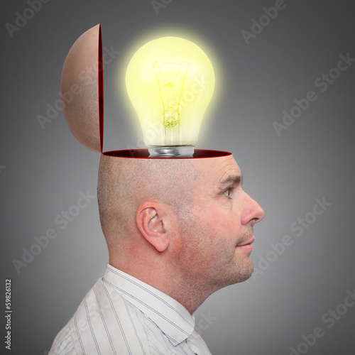 Photo: Businessman with his idea or solution. Businessman with his idea or solution.