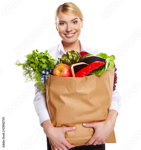 Photo: woman shopping for fruits and vegetables woman shopping for fruits and vegetables