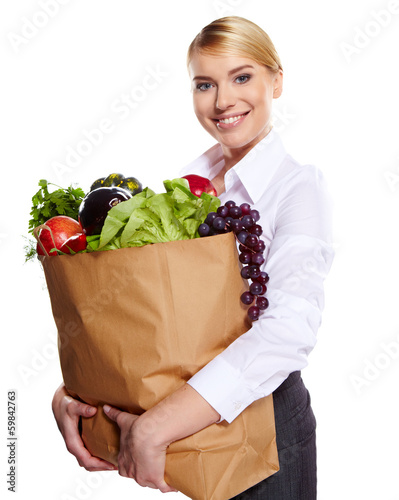 Photo: woman shopping for fruits and vegetables woman shopping for fruits and vegetables