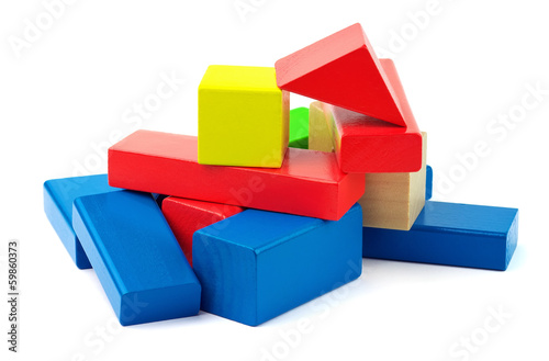 Photo: Wooden colorful bricks isolated on white background. Wooden colorful bricks isolated on white background.