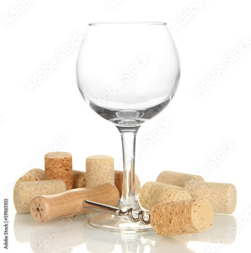 Photo: Wineglass and corks isolated on white Wineglass and corks isolated on white