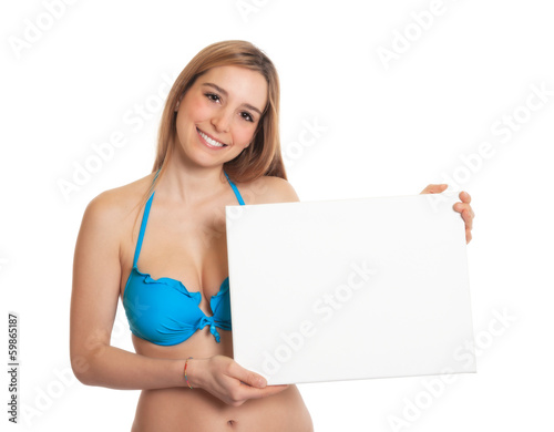 Photo: Frau im blauen Bikini mit Werbetafel Frau im blauen Bikini mit Werbetafel