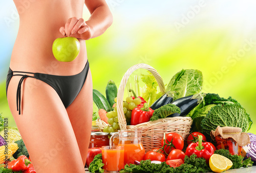 Photo: Dieting. Balanced diet based on raw organic vegetables Dieting. Balanced diet based on raw organic vegetables