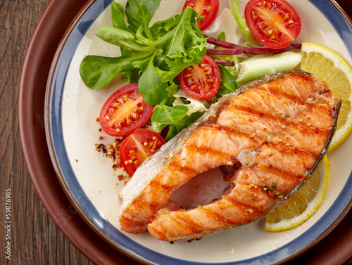Photo: fresh grilled salmon steak slice fresh grilled salmon steak slice