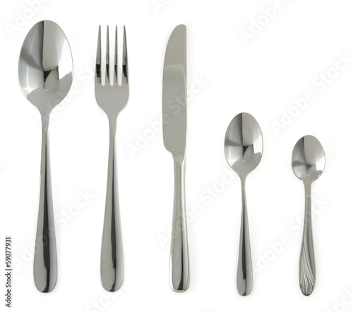Photo: spoon, knife and fork on white spoon, knife and fork on white