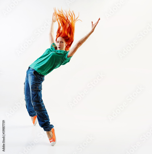 Photo: Modern style dancer jumping Modern style dancer jumping