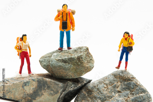 Photo: 登山しているミニチュアの人形 登山しているミニチュアの人形