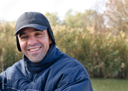 Photo: Happy man in warm clothing Happy man in warm clothing
