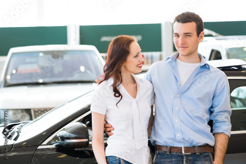 Photo: Young couple in the showroom Young couple in the showroom