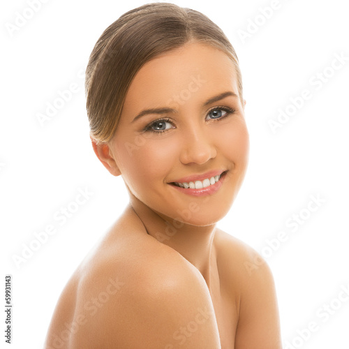 Photo: Beautiful girl with perfect skin on a white background Beautiful girl with perfect skin on a white background