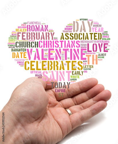 Photo: Valentine concept Asian male holding a heart shape tag cloud Valentine concept Asian male holding a heart shape tag cloud