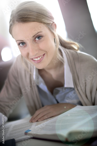 Photo: Student girl studying in business school Student girl studying in business school