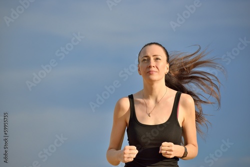Photo: Woman jogging outdoors Woman jogging outdoors