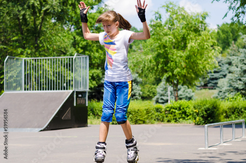 Photo: Young teenage girl in a skate park Young teenage girl in a skate park