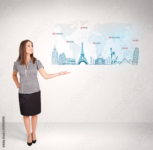 Photo: Business woman presenting map with famous cities and landmarks Business woman presenting map with famous cities and landmarks